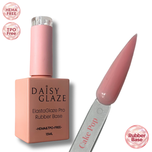 Cake Pop tinted rubber base by Daisy Glaze in dusty mauve-pink, shown beside the bottle