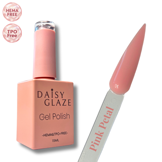 Pink Petal gel polish by Daisy Glaze in soft, peachy pink, shown beside the bottle