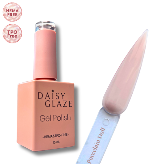Porcelain Doll gel polish by Daisy Glaze in sheer porcelain pink, shown beside the bottle