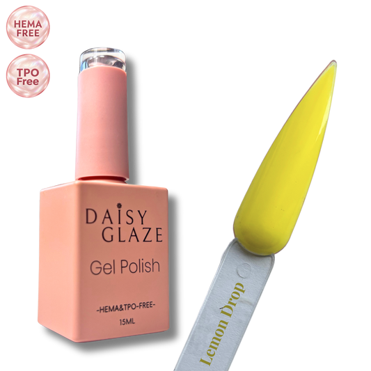 Lemon Drop gel polish by Daisy Glaze in bright lemon yellow, shown beside the bottle