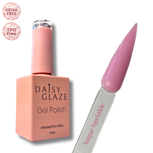 Sugar Sprinkle gel polish by Daisy Glaze in dusty mauve-pink, shown beside the bottle