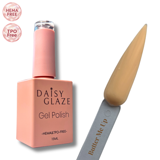 Butter Me Up gel polish by Daisy Glaze in warm butterscotch beige, shown beside the bottle