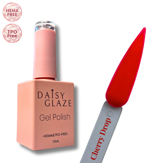 Cherry Drop gel polish by Daisy Glaze in bright cherry red, shown beside the bottle