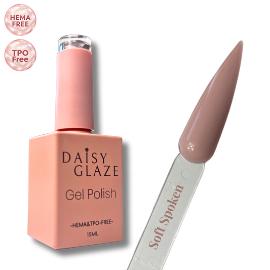 Soft Spoken gel polish by Daisy Glaze in soft taupe greige, shown beside the bottle